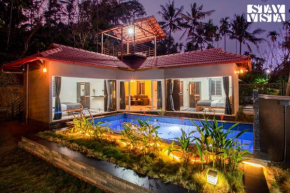StayVista at Palm Tree Homes with Complimentary Breakfast, BBQ Grill and Pet-Friendly Home